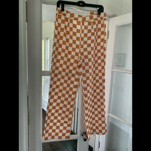 Orange and white checkered flare pants
